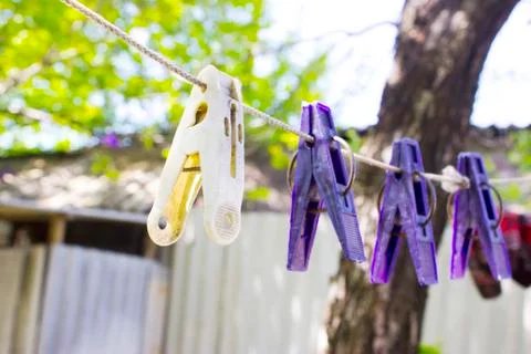Clothespins on a rope Foto stock