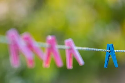 Clothespins on a rope Stock Photos