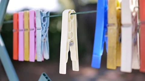 Clothespins Swinging in the Wind Stock Footage 78630637