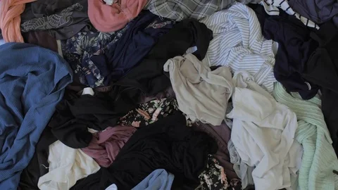 Clothing Clutter being Cleared Stock Footage 104148672