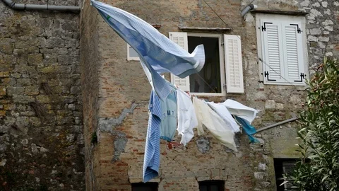 Clothing hanging on a line Video stock 87983950