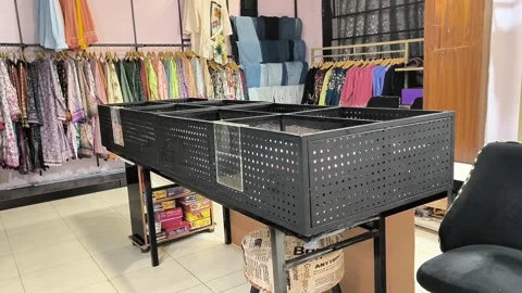 Clothing Store Interior with Garment Display Racks, 13/9/2026, Islamabad Stock Footage 345439163