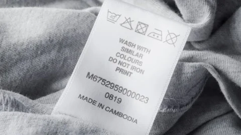 Clothing washing instructions label macro close up stock footage Stock Footage