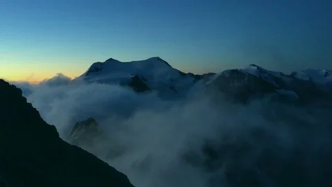 Cloud And Fog Float Over Mountain Stockbeeldmateriaal 76035745