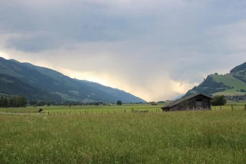 Cloud and Green Field Kaprun Austria Stock Photos