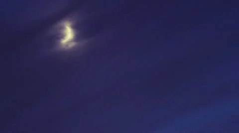 A Cloud and  Moon time-lapse in the  night sky Stock Footage 11104472
