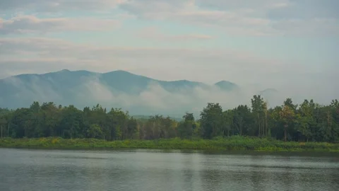 Cloud and sky  with mountain and lake on foreground Stock Footage 296215002