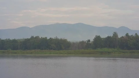 Cloud and sky  with mountain and lake on foreground Stock Footage 301508984