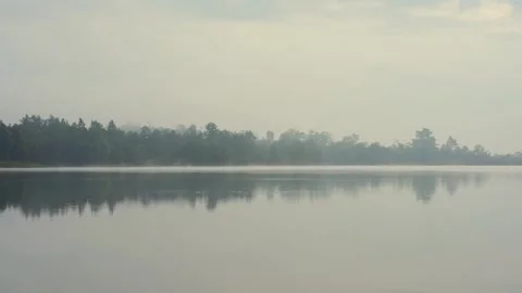 Cloud and sky  with mountain and haze on lake on foreground Stock Footage 301508985