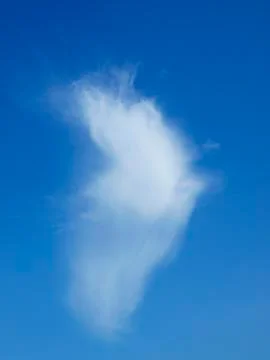 A cloud and a sky Stock Photos