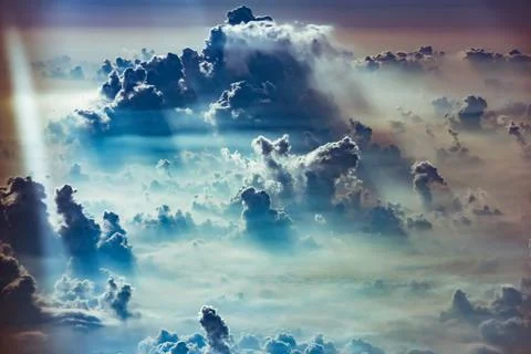 Cloud and sky view from the window of an airplane Stock Photos