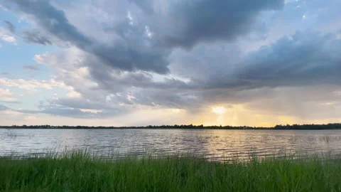 Cloud and sun light over the lake pond. d Stock Footage 158043764