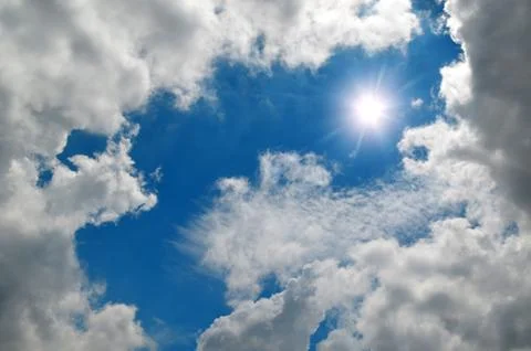 Cloud and sun on sky Stock Photos