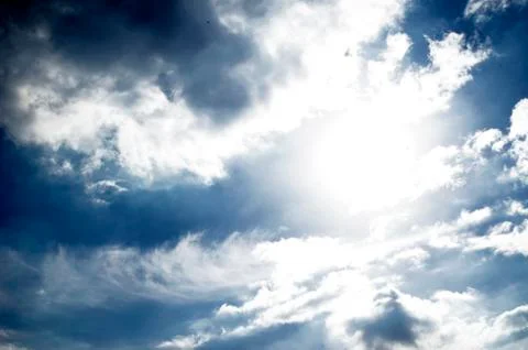 Cloud and sun on sky Stock Photos