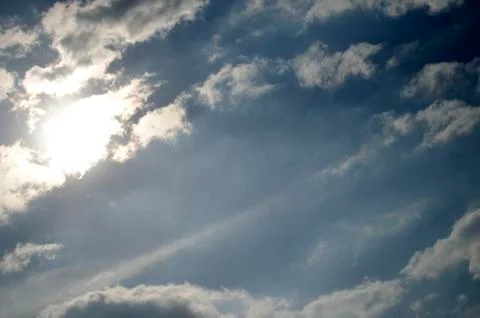 Cloud and sun on sky Stock Photos