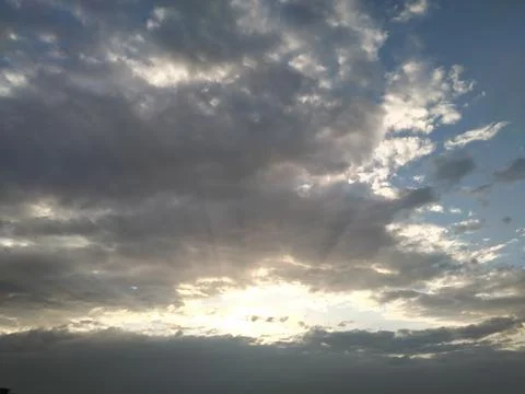 Cloud and Sunbeam Stock Photos