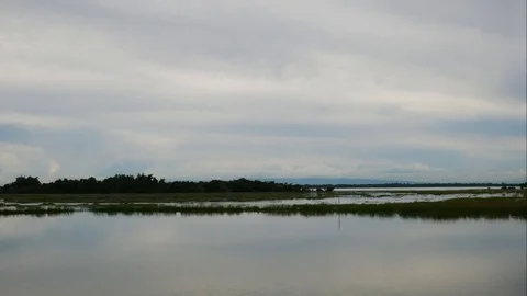 Cloud and water moving in timelapse seen Stock Footage 78656246