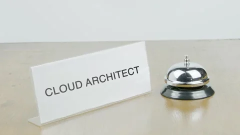 Cloud Architect Office or Room with Hand Ringing The Bell on Desk or Table Stock Footage 300638096