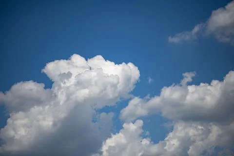 Cloud background with blue sky. Cloud texture and white clouds. Bright sky wi Stock Photos