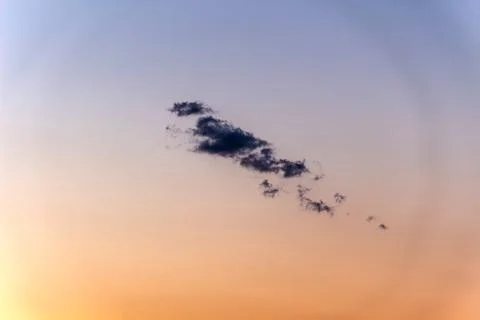 Cloud on a background of purple-orange sky Foto stock