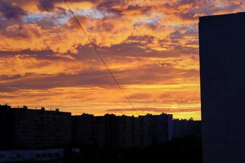 Cloud backlit by the setting sun Stock Photos