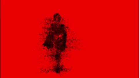 Cloud of black tiny particles gathering into the human silhouette that is 스톡 동영상 162034409