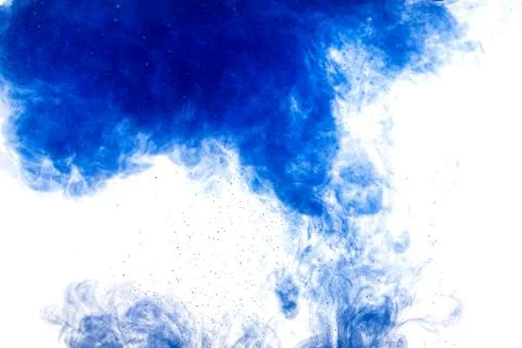 A cloud of blue paint released into clear water. Isolate on a white backgroun Stock Photos