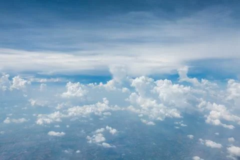 Cloud with blue sky from airplane window Stock Photos