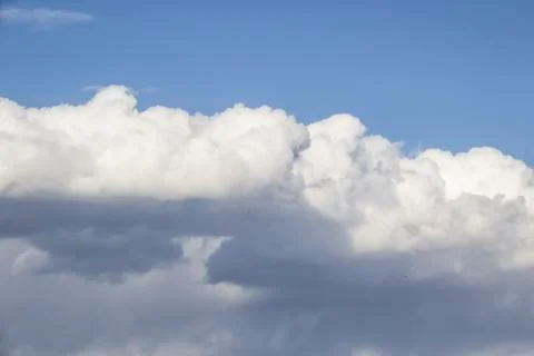 Cloud in the blue sky. A beautiful clouds against the blue sky background. Be Stock Photos