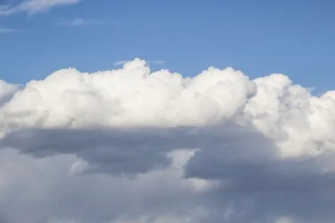 Cloud in the blue sky. A beautiful clouds against the blue sky background. Be Stock Photos