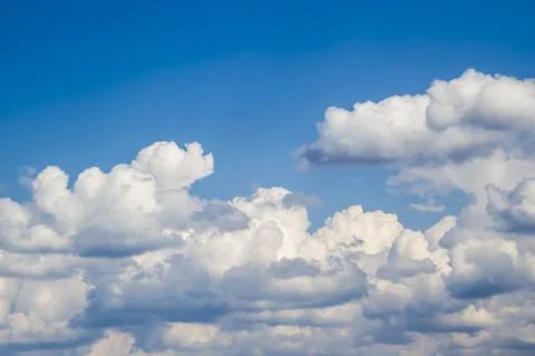 Cloud in the blue sky. A beautiful clouds against the blue sky background. Be Stock Photos