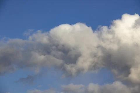 Cloud in the blue sky. A beautiful clouds against the blue sky background. Be Stock Photos
