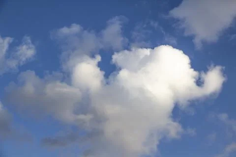 Cloud in the blue sky. A beautiful clouds against the blue sky background. Be Stock Photos