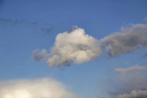 Cloud in the blue sky. A beautiful clouds against the blue sky background. Be Stock Photos