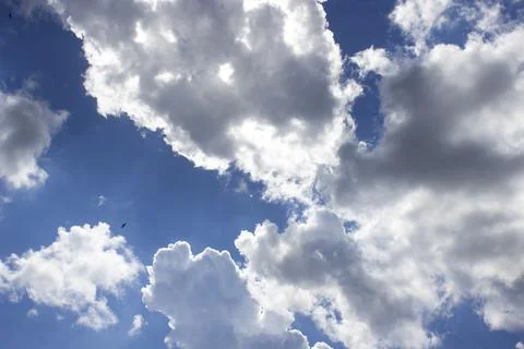 Cloud in the blue sky. A beautiful clouds against the blue sky background. Stock Photos