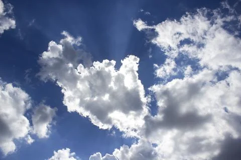 Cloud in the blue sky. A beautiful clouds against the blue sky background. Stock Photos