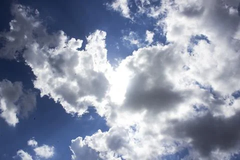 Cloud in the blue sky. A beautiful clouds against the blue sky background. Stock Photos