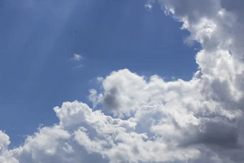 Cloud in the blue sky. A beautiful clouds against the blue sky background. Stock Photos