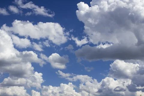 Cloud in the blue sky. A beautiful clouds against the blue sky background. Stock Photos