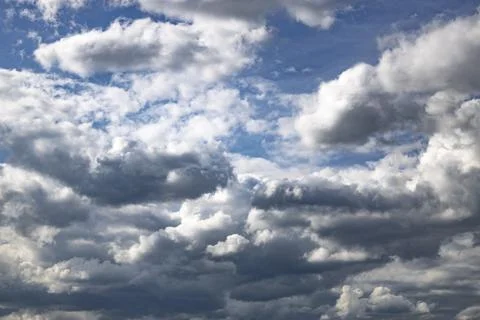 Cloud in the blue sky. A beautiful clouds against the blue sky background. .. Stock Photos
