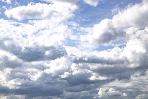 Cloud in the blue sky. A beautiful clouds against the blue sky background. .. Stock Photos