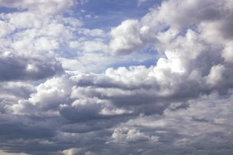 Cloud in the blue sky. A beautiful clouds against the blue sky background. .. Stock Photos