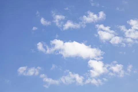 Cloud in the blue sky. A beautiful clouds against the blue sky background. .. Stock Photos
