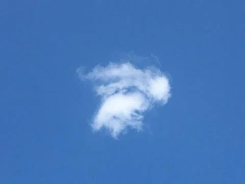 A cloud with a blue sky Stock Photos