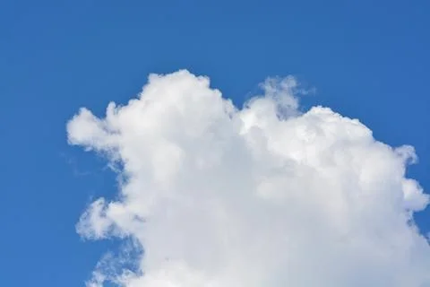 Cloud in the blue sky... Stock Photos