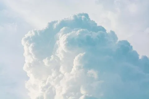 Cloud in the blue sky... Stock Photos