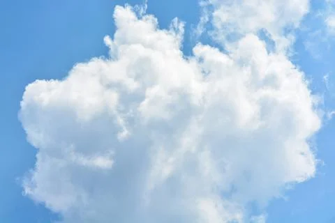 Cloud in the blue sky... Stock Photos