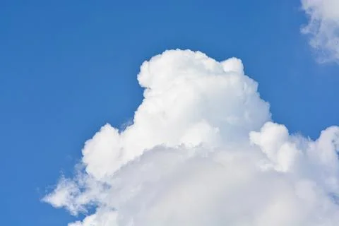 Cloud in the blue sky... Stock Photos
