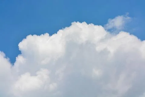 Cloud in the blue sky... Stock Photos