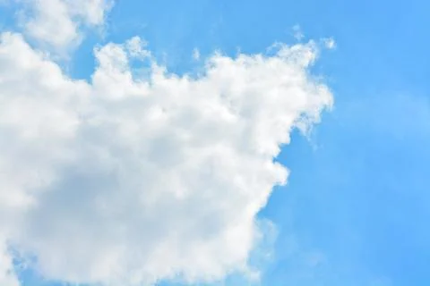 Cloud in the blue sky... Stock Photos